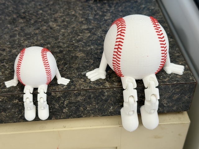 Baseball large and small side by side